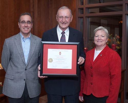 Citation recipient Dr. James Muren (center) with Dean Jeanette Roberts (right) and Brian Mc Ilhone (left)