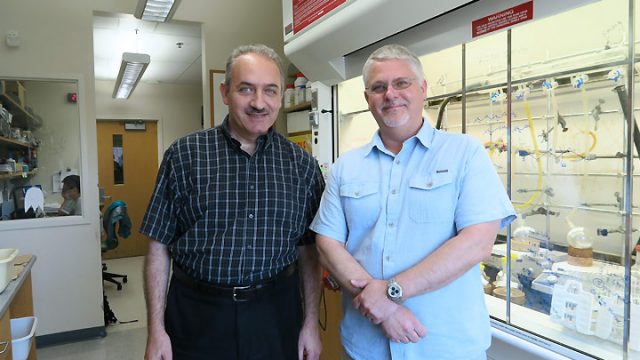 Dr. Sandro Mecozzi with Dr. Michael Taylor in the lab