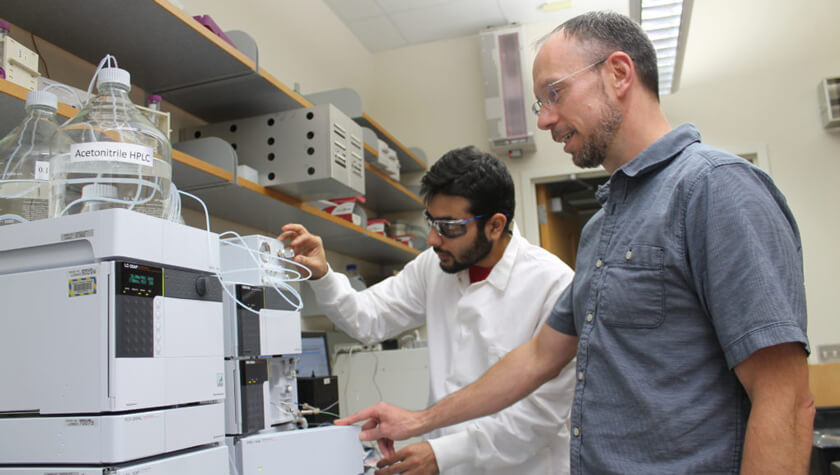 Professor Tim Bugni advises graduate student Shaurya Chanana in the Bugni Lab.