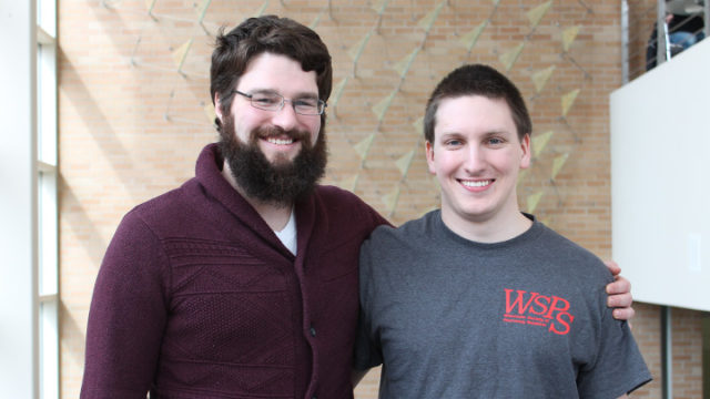 2nd year pharmacy students Noah Budi (left) and Collin Dean (right) stand together in Rennebohm Hall