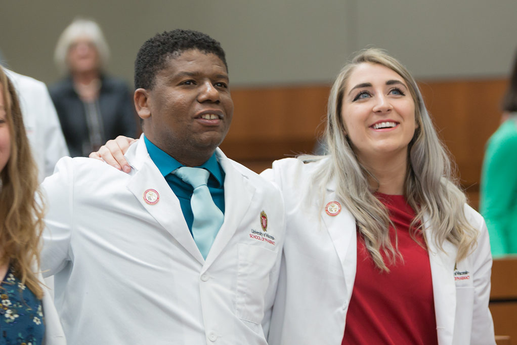 Student pharmacists celebrate their achievement during the ceremony.
