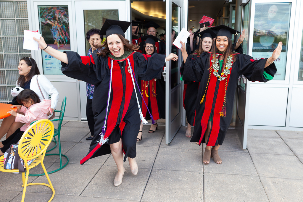 Students celebrate their graduation day and running out the doors