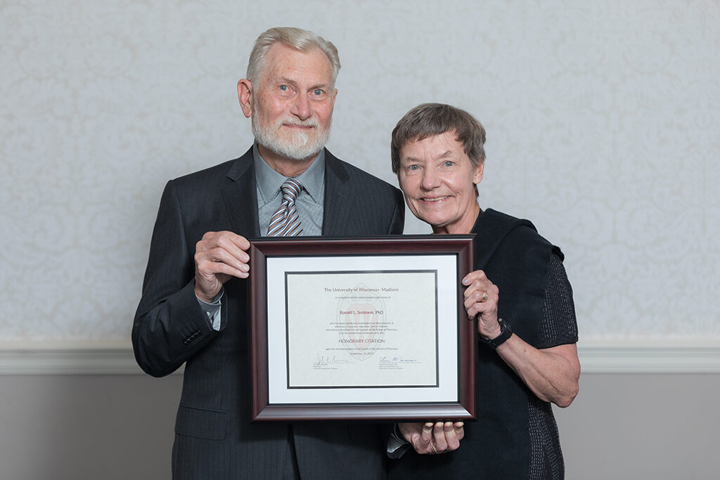 Ron and Christine Sorkness with Ron's Citation award.