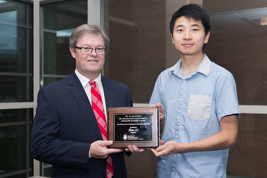 Chuck Lauhon with graduate student award winner