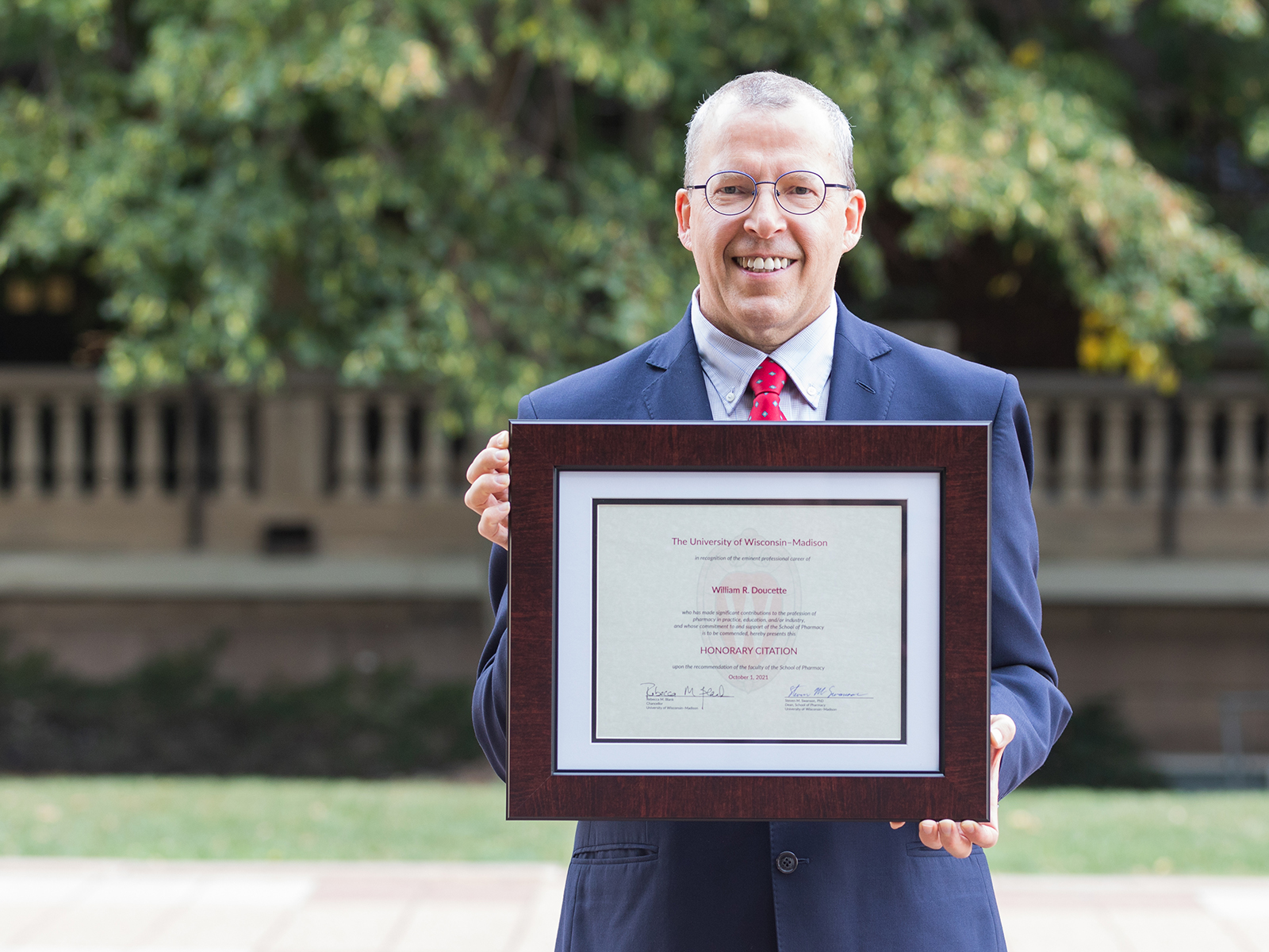 Bill Doucette poses with his framed Citation Award