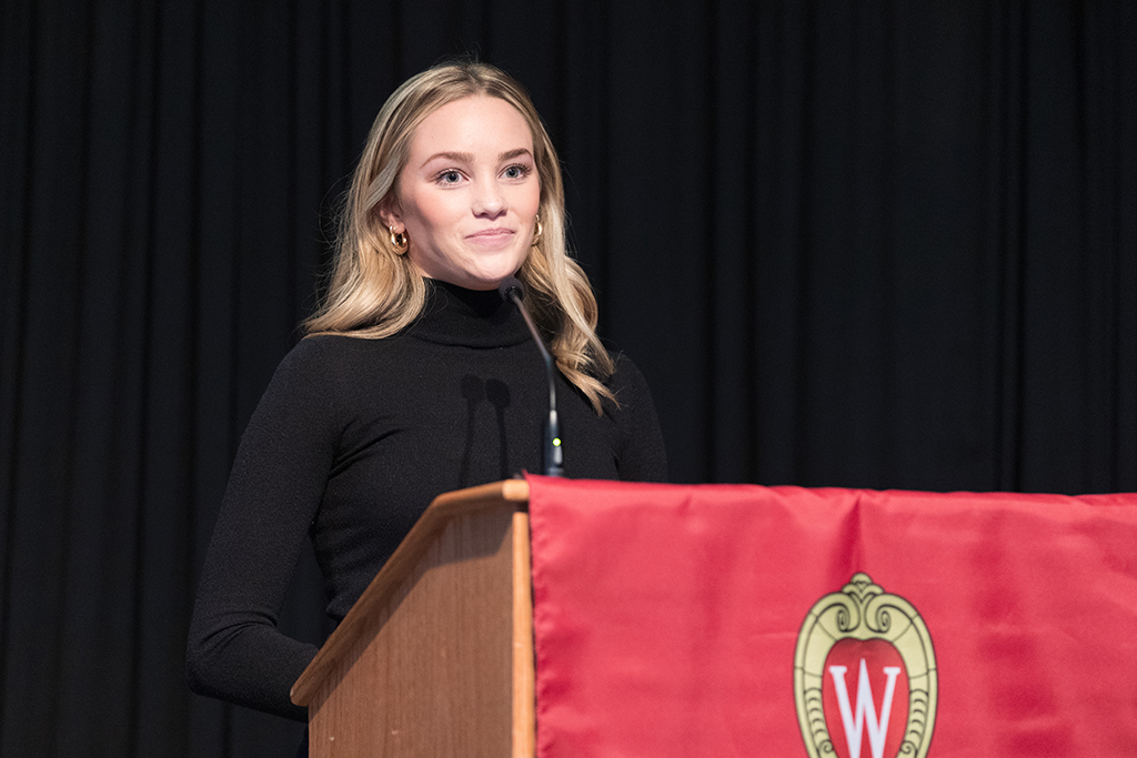 Taylor Lueder speaks during the 2022 White Coat Ceremony.