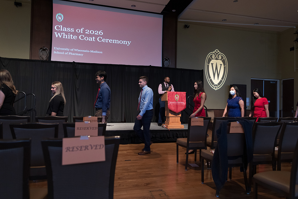 Michael Nome speaks as students line up during the 2022 White Coat Ceremony.