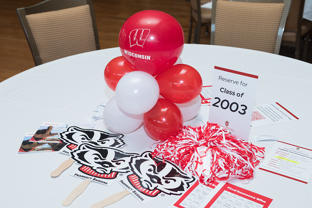Table with balloons and props labelled "Reserve for Class of 2003"