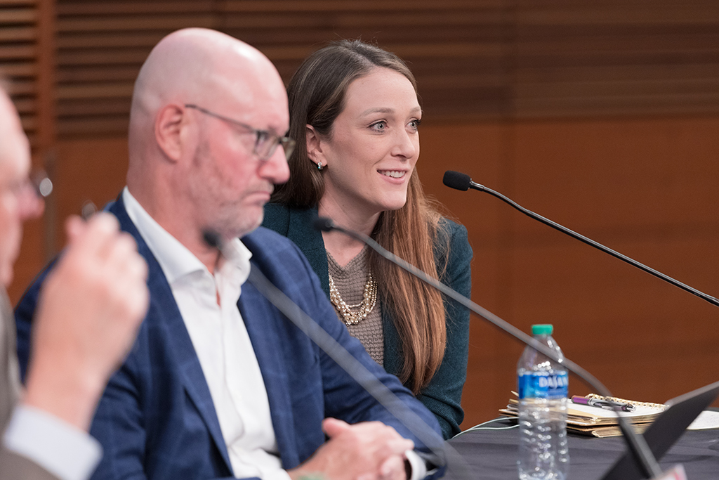 Kristin Tiry speaks during the panel discussion, next to Steve Rough