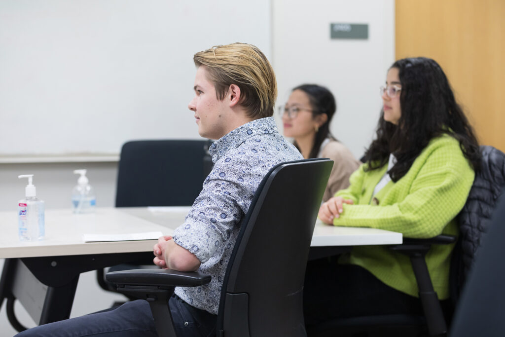 PharmD students listen to a presentation during the DiveRxsity Dialogues event.