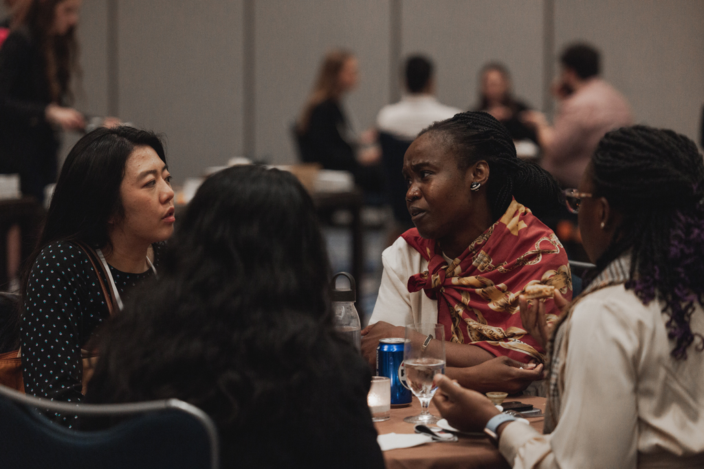 Jenny Li and Adati Tarfa chat with a group