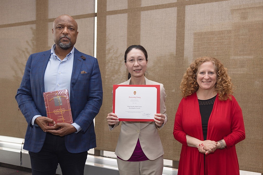 Charles Isbell, Jiaoyang Jiang, and Jennifer Mnookin pose at the Vilas Award ceremony